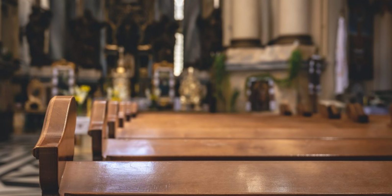 interior-details-catholic-church-with-wooden-benches