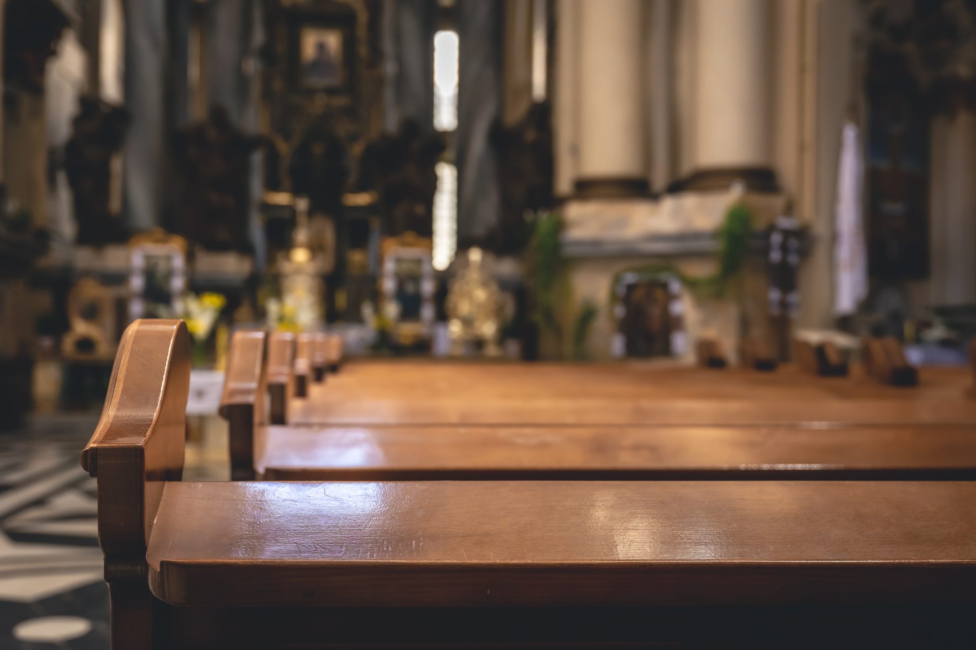 interior-details-catholic-church-with-wooden-benches